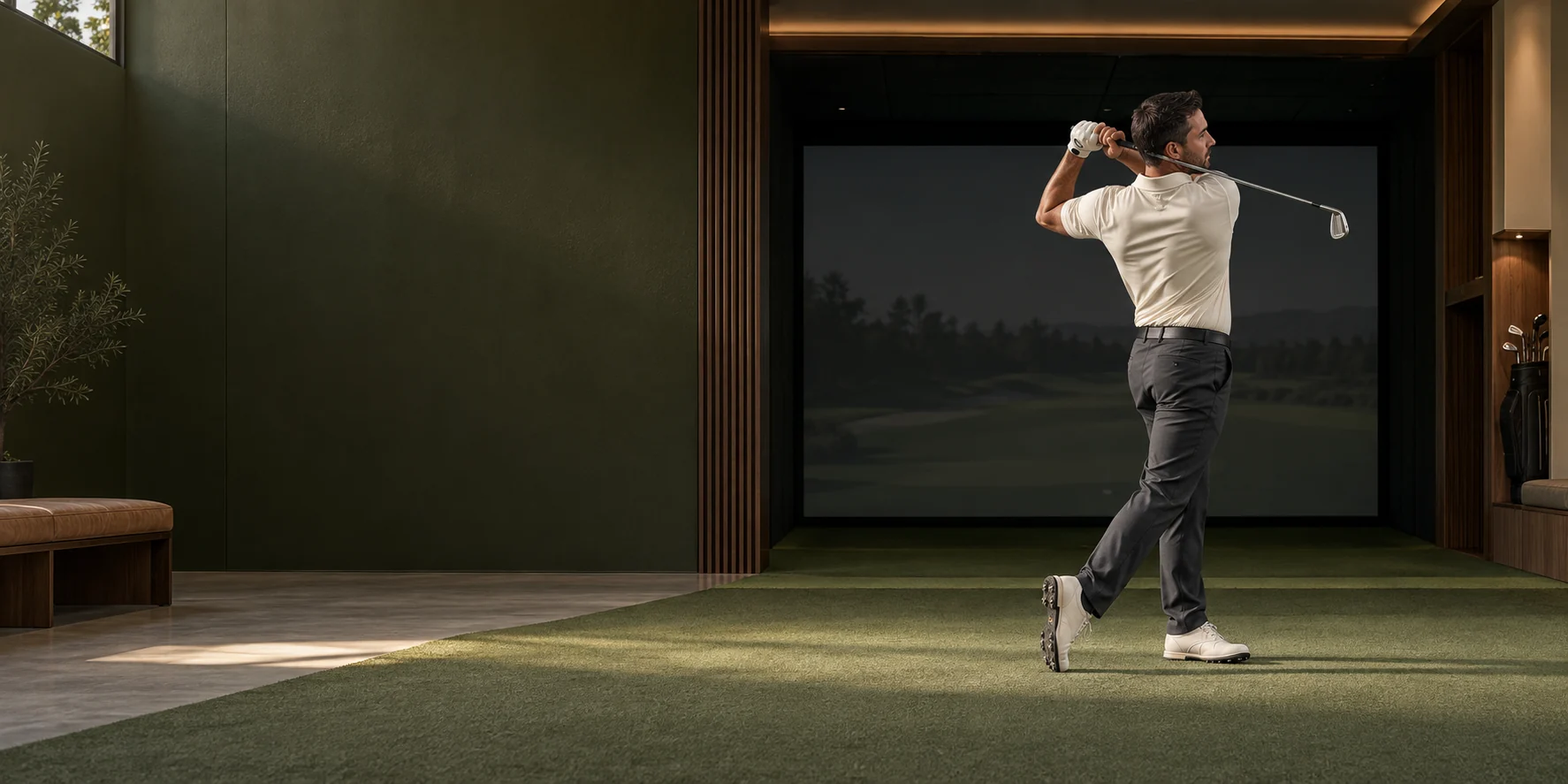 Illustrative golfer holding a balanced finish in an indoor simulator bay.